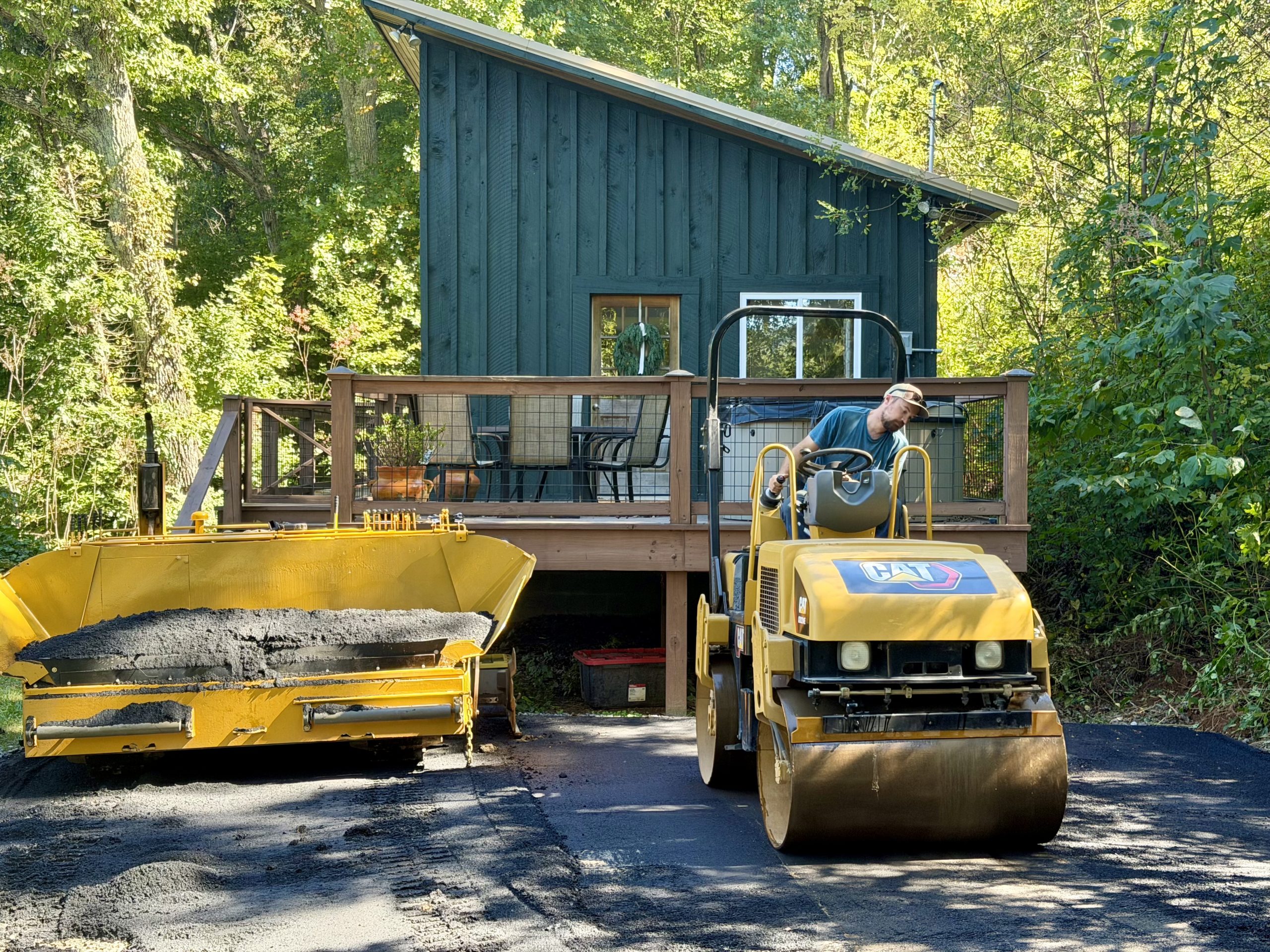 Hendrix Paving rolling a new driveway